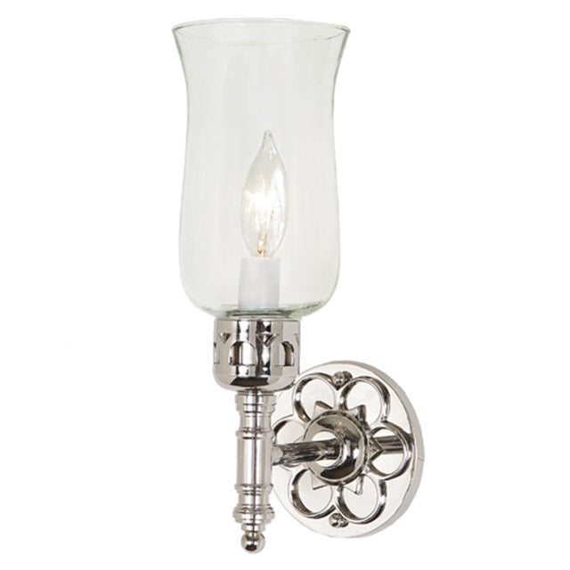 One light cast brass sconce with glass shade