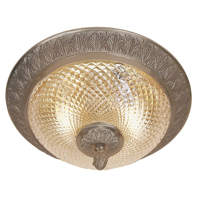 Small cast brass flush mount with crystal glass